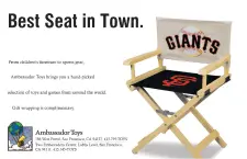 Horizontal newspaper advertisement featuring San Francisco Giants Director's Chair, with headline "Best Seat in Town."