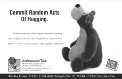 B&W half-page newspaper advertisement featuring Gund teddy bear, with headline "Commit Random Acts of Hugging"