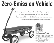 B&W newspaper advertisement featuring red Radio Flyer toy wagon, with headline "Zero-Emission Vehicle."